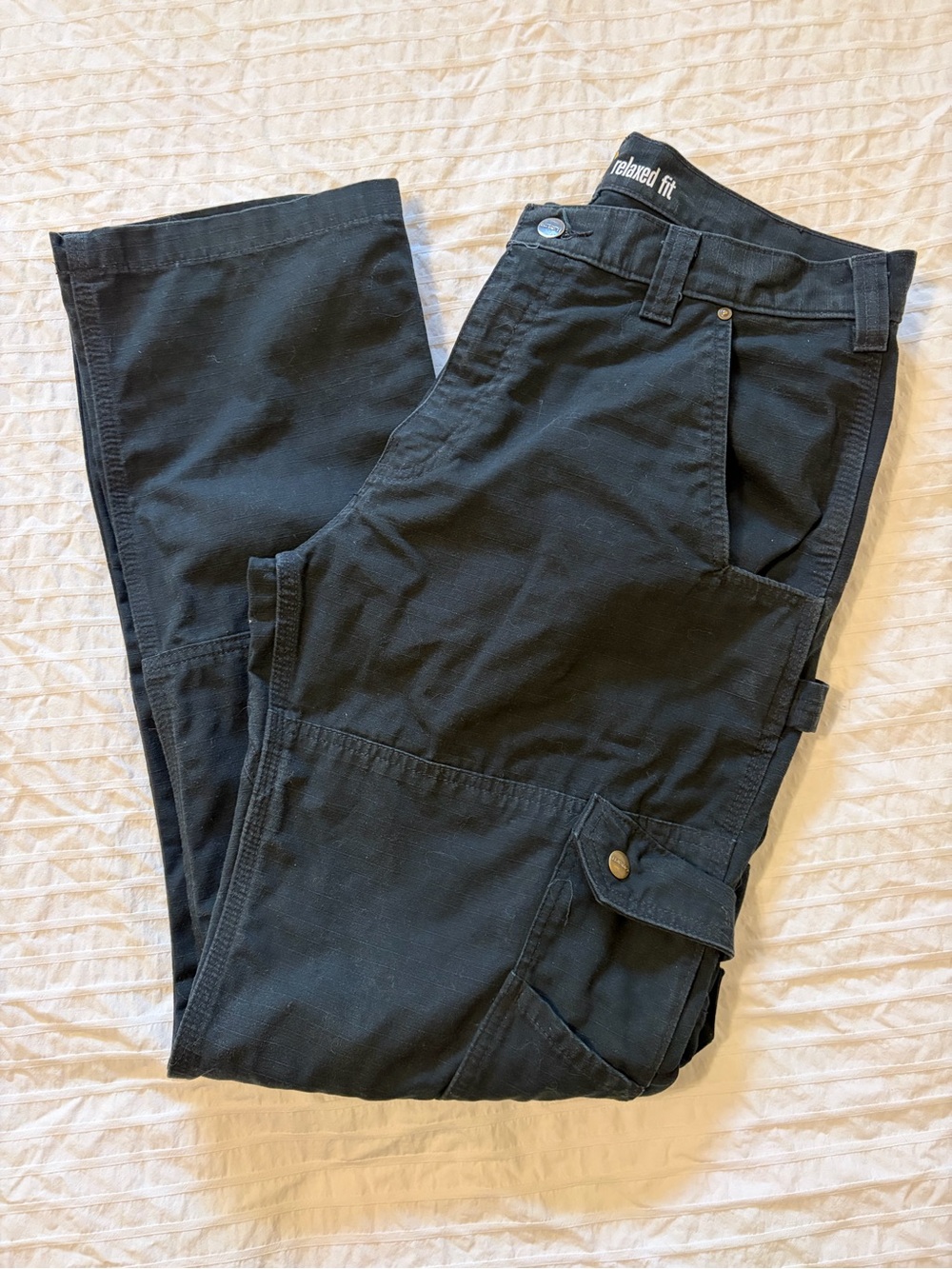 CARHARTT- Men's 34/32 Relaxed Fit Ripstop Cargo Work Pants in black.